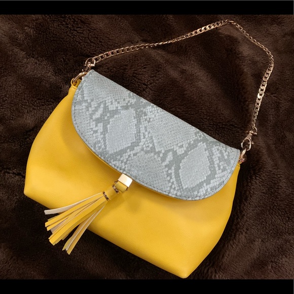 pastel yellow clutch bag